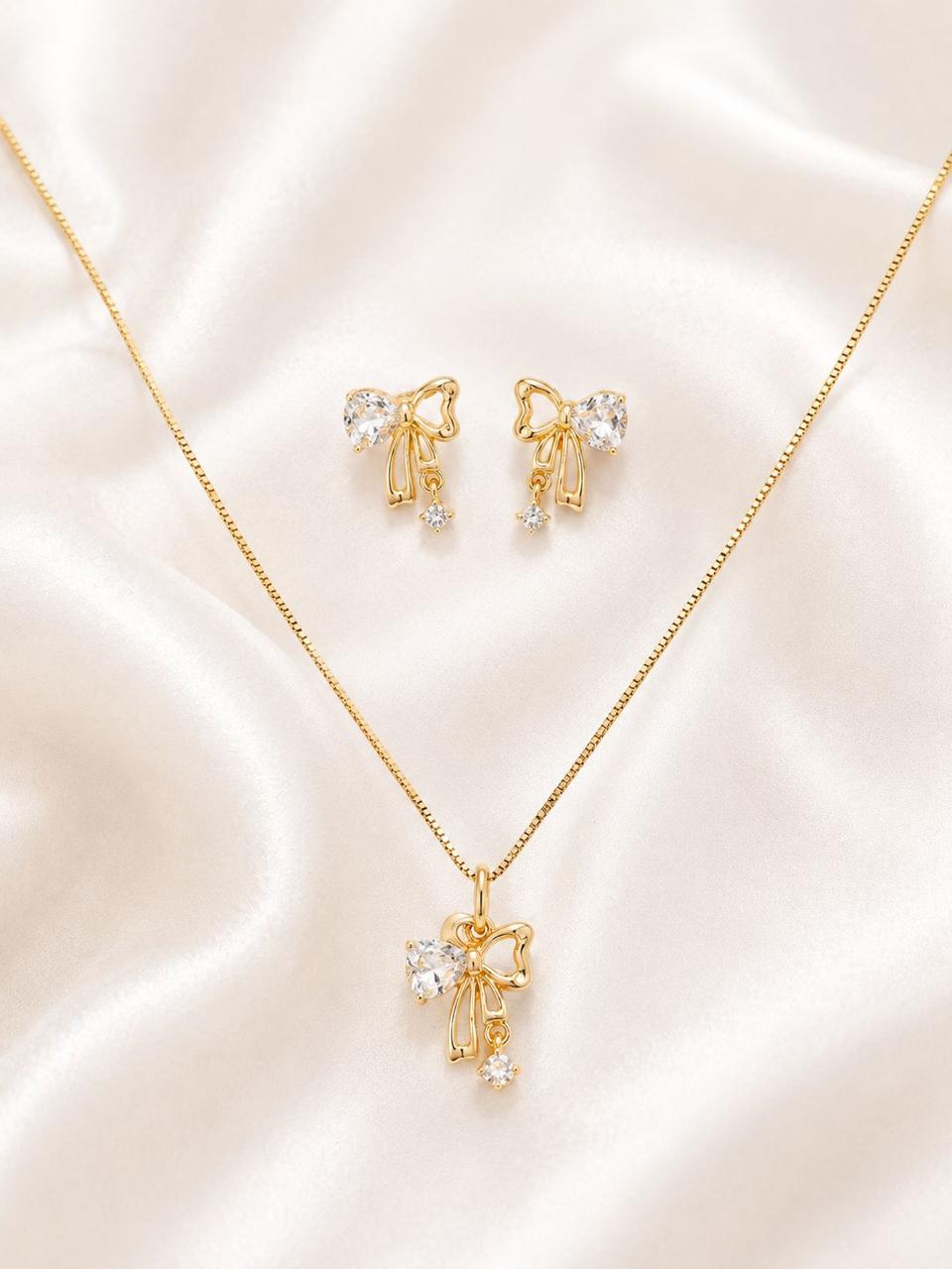 Conjunto de colar e brincos laço banhados a ouro da Esper Semijoias
